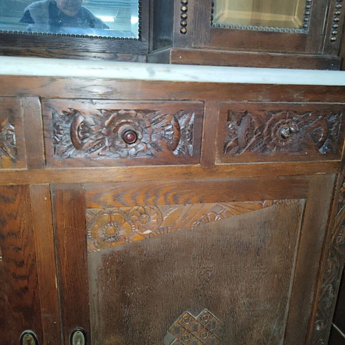Carved antique buffet used with marble top and mirror