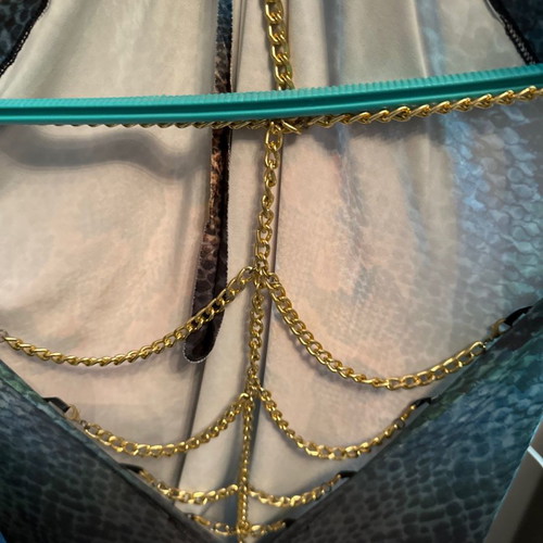 Evening dress used with chain jewelry on the back
