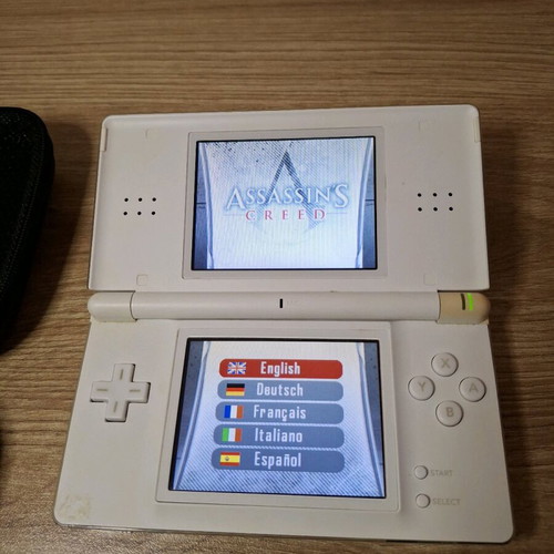Nintendo DS Lite White like new with Assassin's Creed game