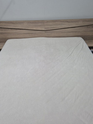 Double bed 140×200 with two built-in nightstands, used