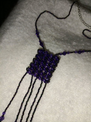 Handmade necklace with purple beads like new