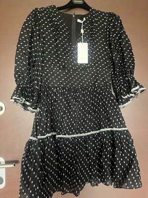 Dress new with leather belt and lace details