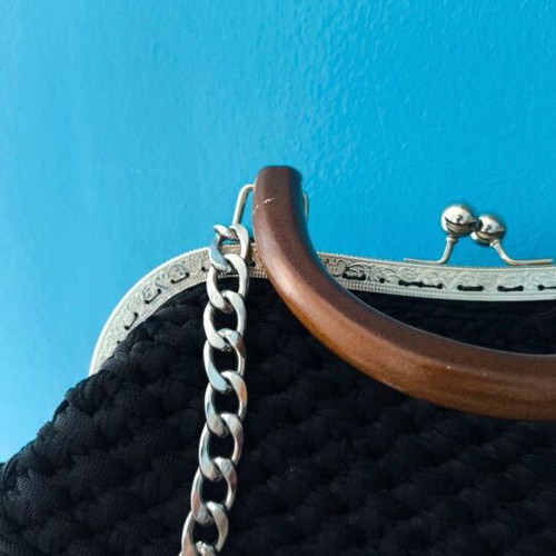 Handmade knitted shoulder bag used, black with wooden handle and chain