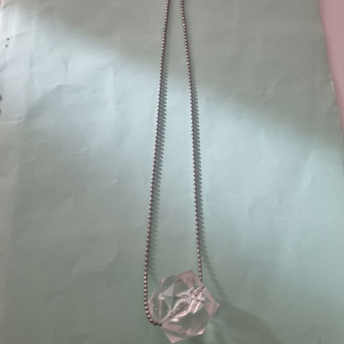 Transparent necklace with silver chain used