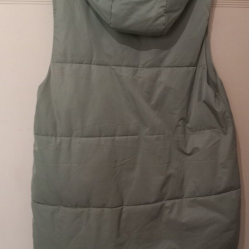 Sleeveless jacket mint color size Large like new