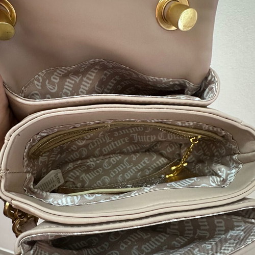 Juicy Couture small crossbody bag nude color with gold design like new
