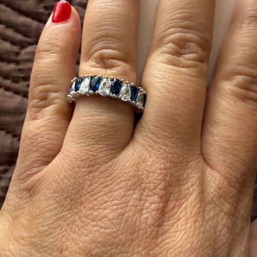 Silver full band ring with blue and white zircons, new