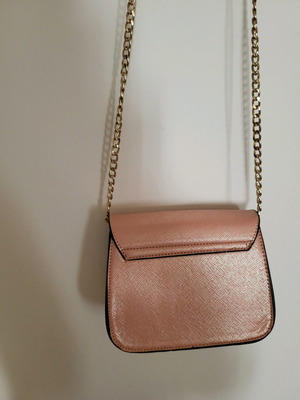 Shoulder bag new in pink-gold color with gold strap
