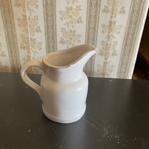 Small used jug with designs