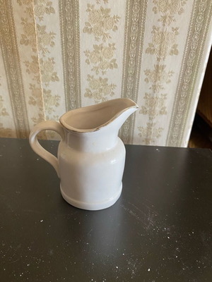 Small used jug with designs