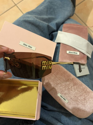 Miu Miu слънчеви очила в кафяво и златисто