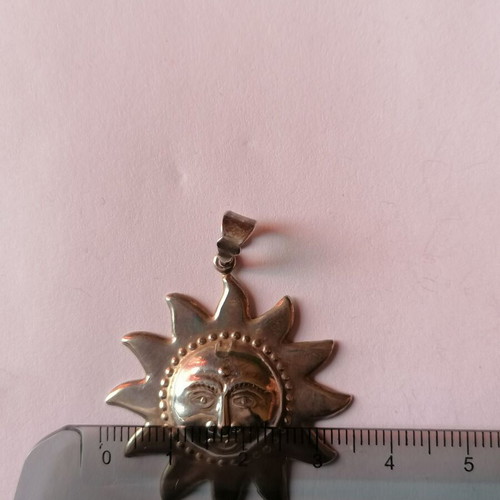 Silver 925 sun pendant new with embossed face