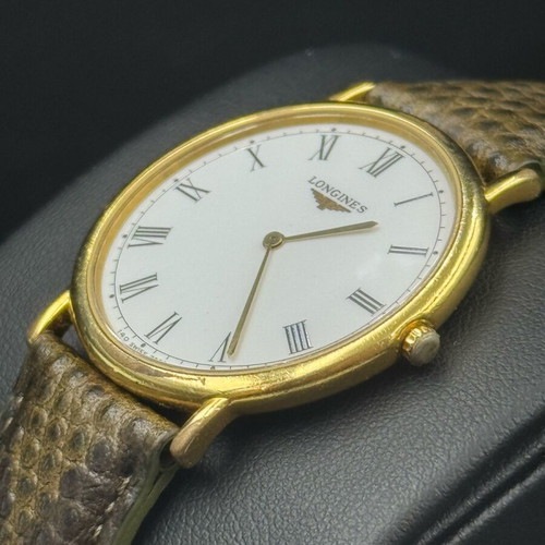 Longines Le Grande Clasique watch used, gold color, battery powered
