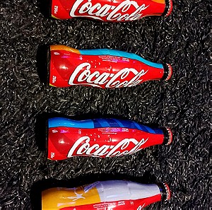 Συλλεκτικά μπουκάλια Coca Cola 2004 "Η ΦΛΟΓΑ ΜΑΣ ΕΝΩΝΕΙ ΤΟΝ ΚΟΣΜΟ" Σφραγισμένα