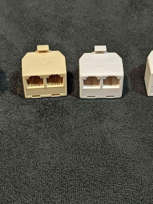 RJ11 telephone cables like new, pack of 42, with 4 splitters