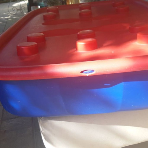 Plastic storage box for toys used with wheels