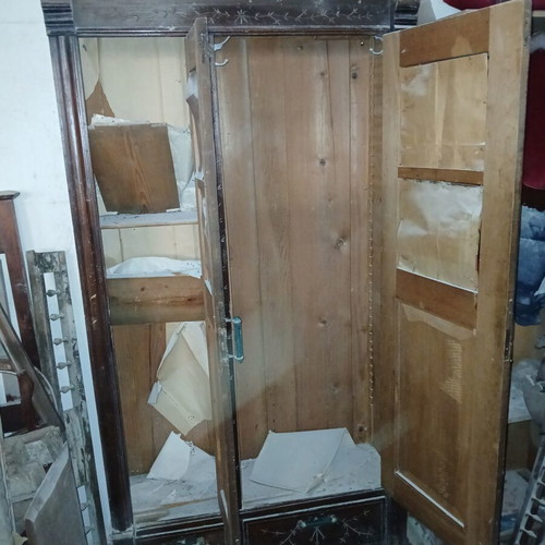 Vintage wooden antique wardrobe with mirrors and drawers