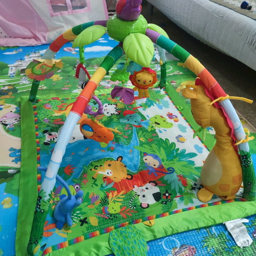 Fisher Price baby gym used with toys