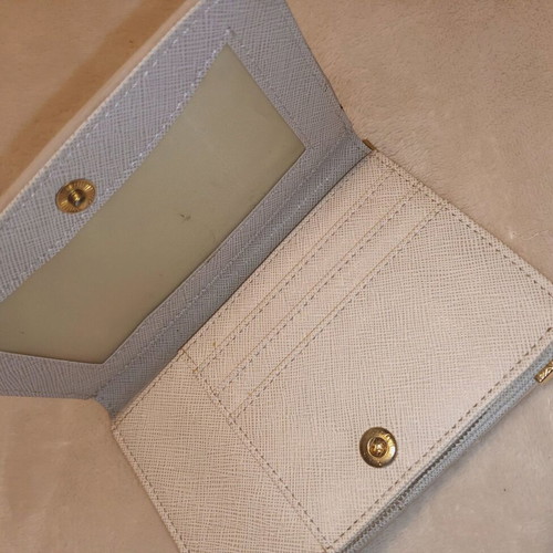 Abbey wrist wallet used, beige with gold details