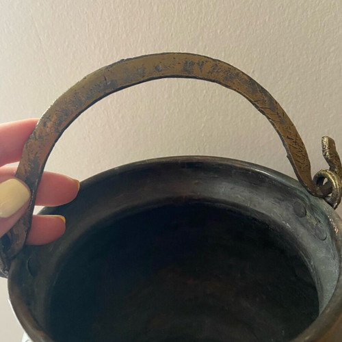 Antique copper container used with bronze handle