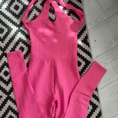 Women's sports jumpsuit with cut-out back like new, pink, size S/M