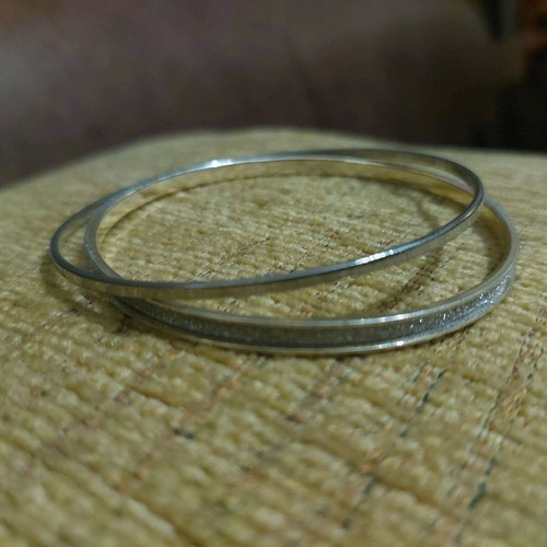 Silver bracelets set of 3 like new with stones and glitter