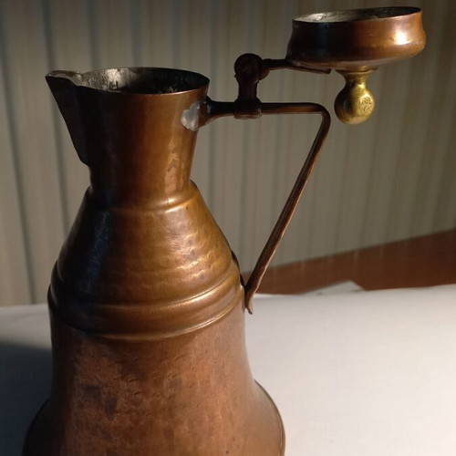 Bronze jug used