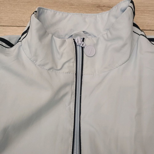 Vintage Nike windbreaker jacket used in ice blue with dark navy details