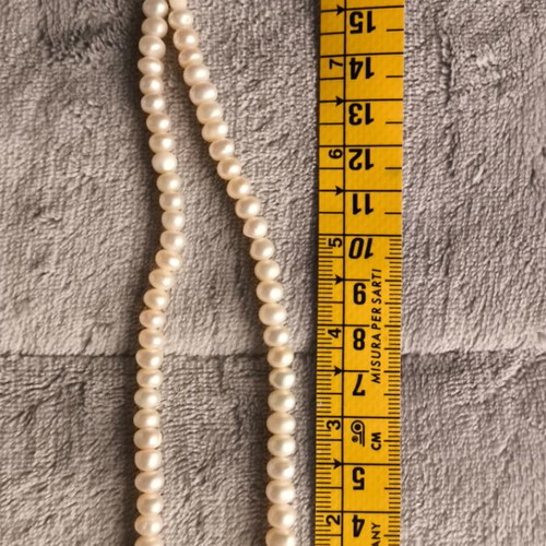 Natural pearl necklace like new, extra pearls for length