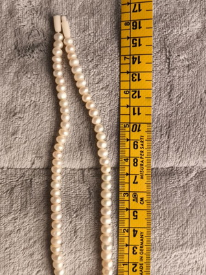 Natural pearl necklace like new, extra pearls for length