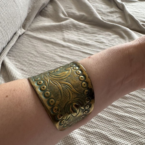 Vintage wide brass cuff bracelet with embossed floral pattern, like new
