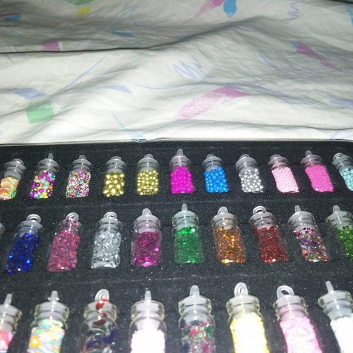 Set of 48 Glitter and Nail Art Flakes in Glass Bottles with Metal Case