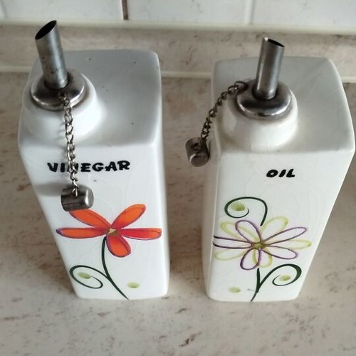 Oil and vinegar set new with decorative designs