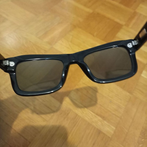 Epos sunglasses new with leather case, black lenses