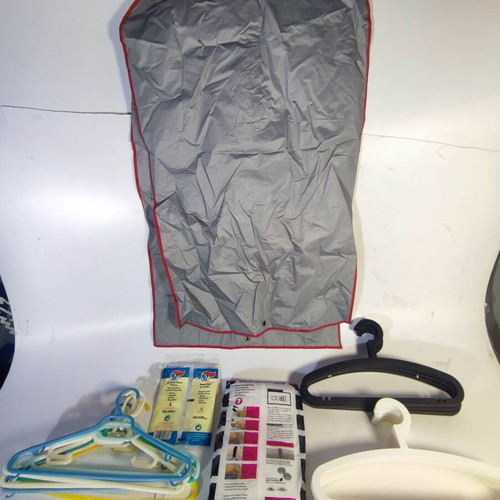 Set of 20 hangers and protective bags like new