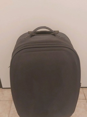Oval medium suitcase like new, gray with wheels