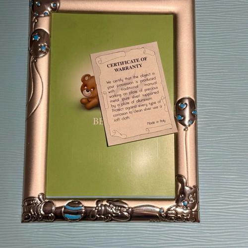 Photo album like new for newborns with silver-plated frame