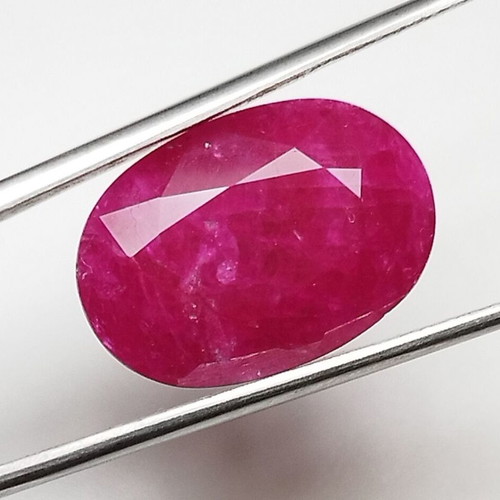 Ruby 10.54 carat hot pinkish red from Mozambique new