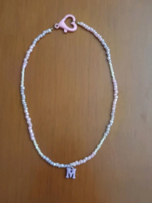 Feux necklace with monogram M, used, with purple and pink beads