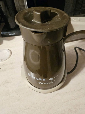 Singer electric briki like new