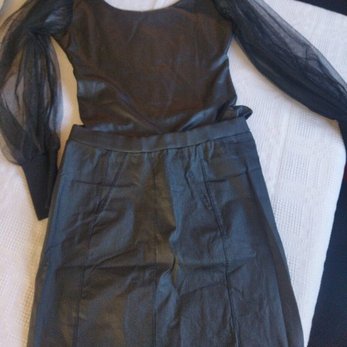 Attrattivo leather skirt like new, black, elastic midi or mini
