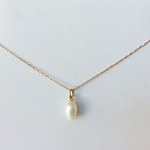 Oval Pearl Pendant like new with Gold-Plated Setting and Ring