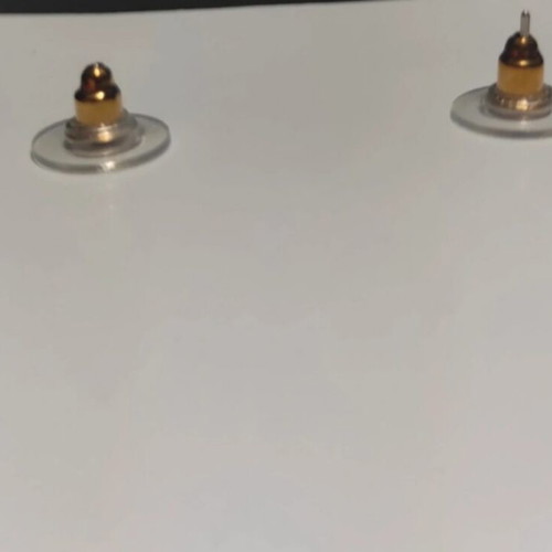 Leo earrings new in packaging faux bijoux