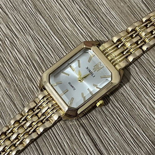Quartz gold wristwatch, steel, missing clasp screw