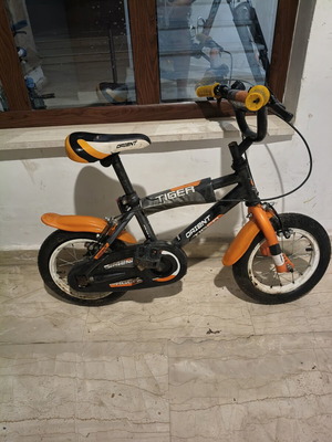 Tiger 12" children's bike used, orange Orient, needs rear tube