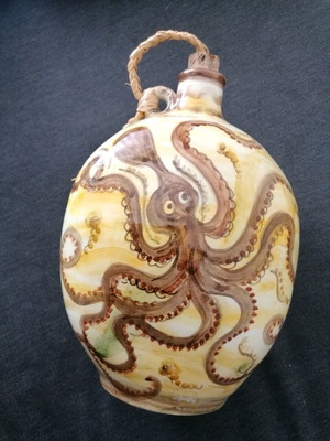 Hand-painted used liquor bottle