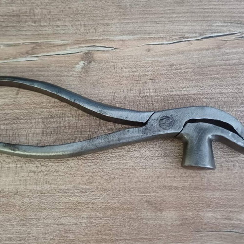 Vintage lasting pliers used cobbler tool for leather stretching and nail removal