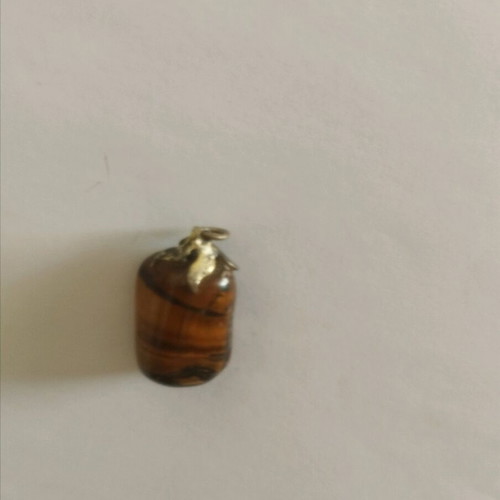 Tiger's Eye pendant like new with silver setting