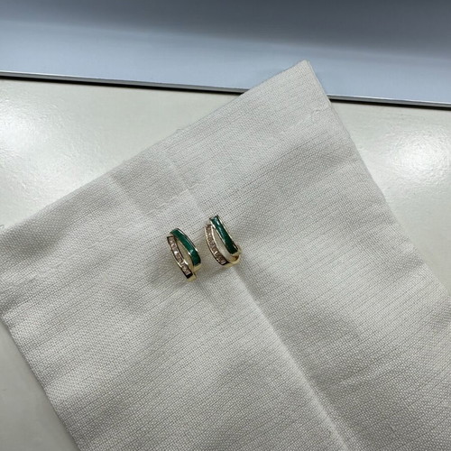 Earrings new with green and gold zirconia