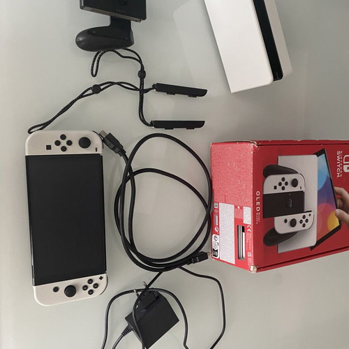 Nintendo Switch OLED used with original accessories and box